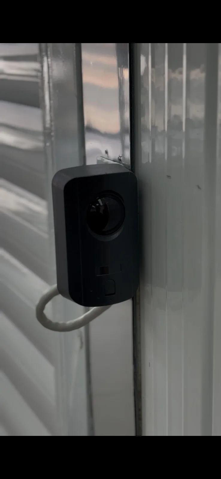 Safety sensor installed on a shutter guide rail