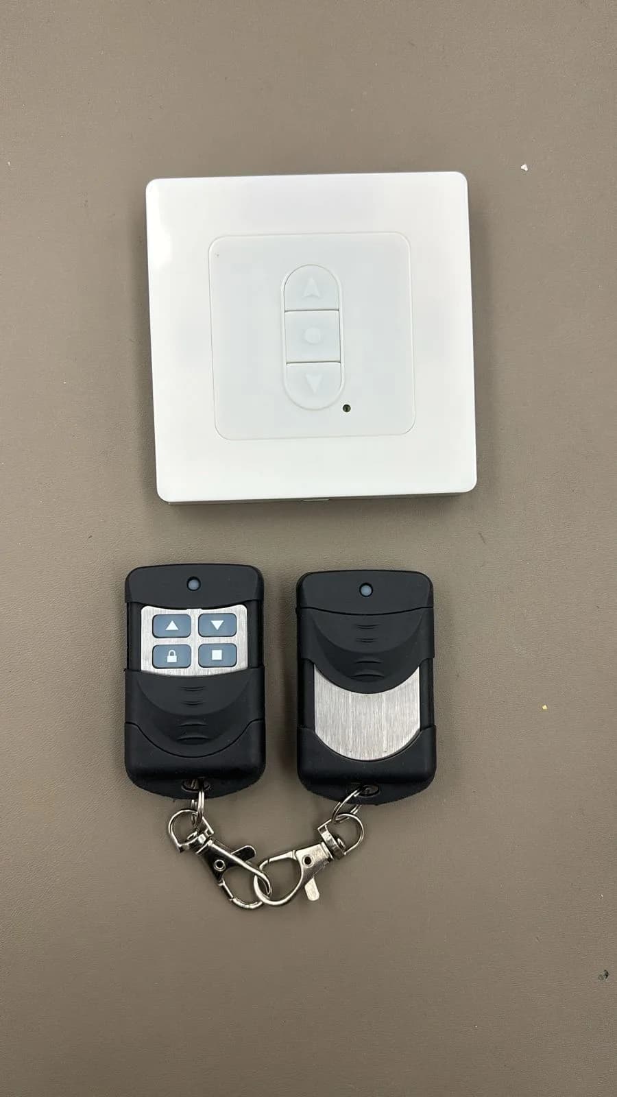 Wall switch supplied alongside two wireless remotes